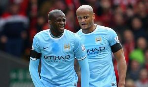 manchester-city-f-c-captain-vincent-kompany-expects-yaya-toure-to-follow-in-the-footsteps-of-aleksandar-kolarov-david-silva-and-samir-nasri-and-commit-his-long-term-future-to-the-club